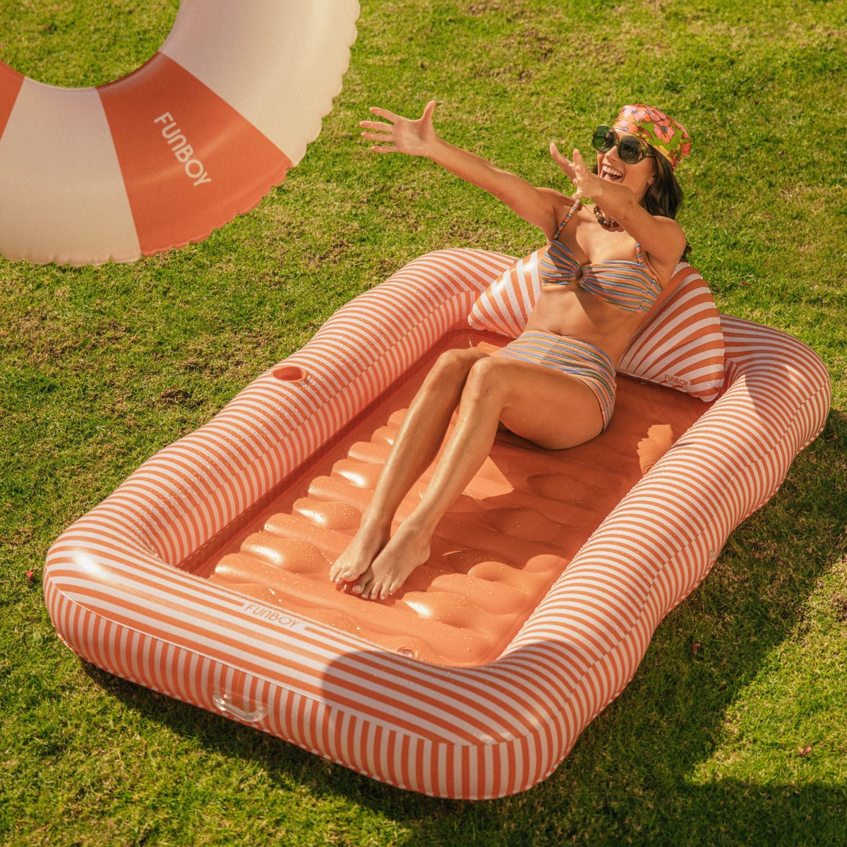 FUNBOY Tanning Pool Lounger: Orange White Stripes