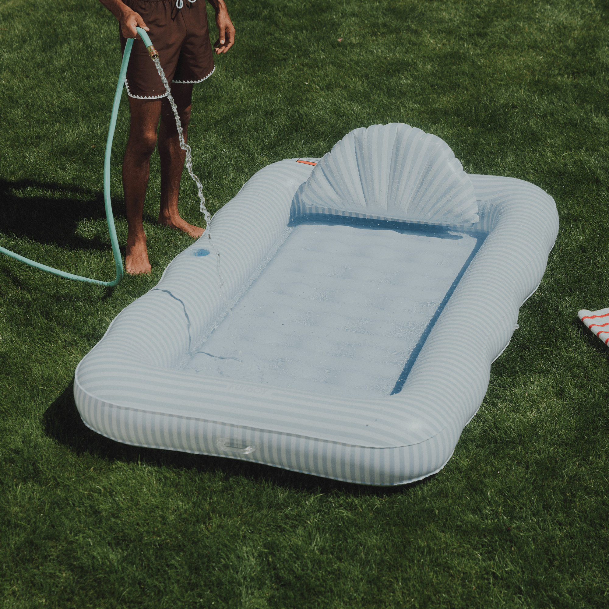 FUNBOY Tanning Pool Lounger: Blue & White Stripes